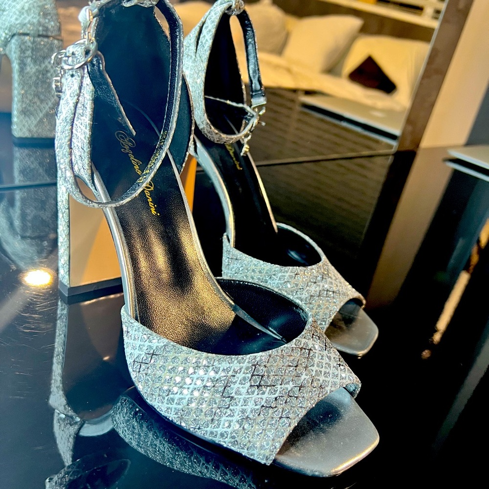 glitter silver shoes 7 size , its new i never were